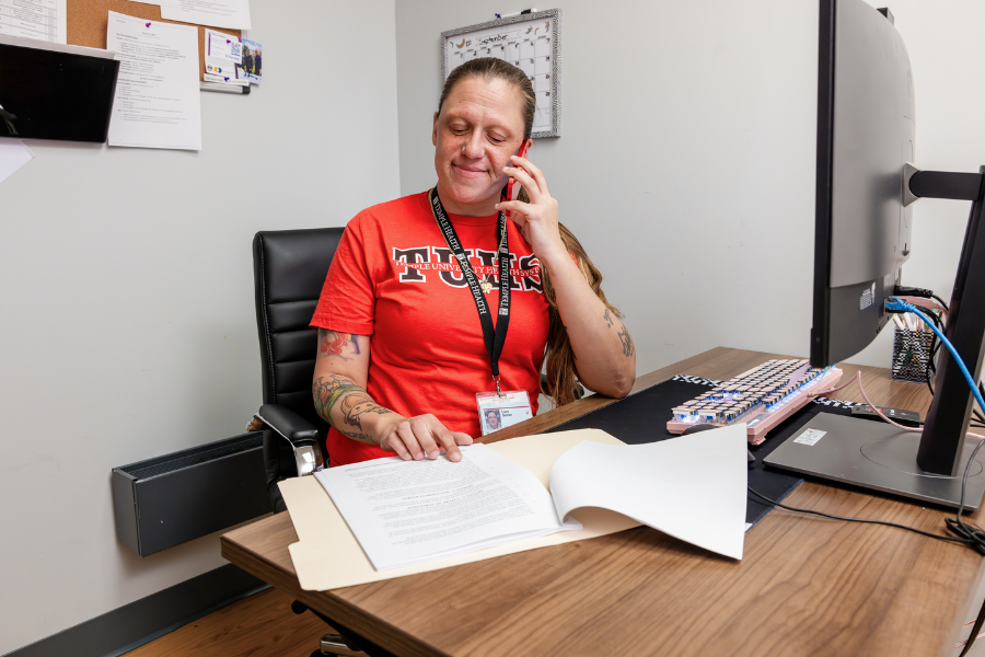 Gehan looks over intake forms.